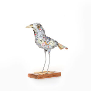 bird sculpture made using beer bottle caps