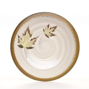 Large shallow serving platter with leaf design. Artist Travis Berning creates this platter on the potters wheel, adds leaf decoration, and finished it with a gold glaze