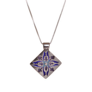The Acorn pendant represents nature and balance. This fine silver necklace has elegant blue and purple enameled accents. This individually handcrafted piece is the perfect piece to add to your jewelry collection.