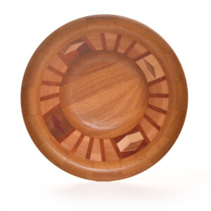Segmented turned bowl made using Iroka, Cherry, Brazilian Cherry, Maple and Walnut. No stains are used. All woods are natural color.