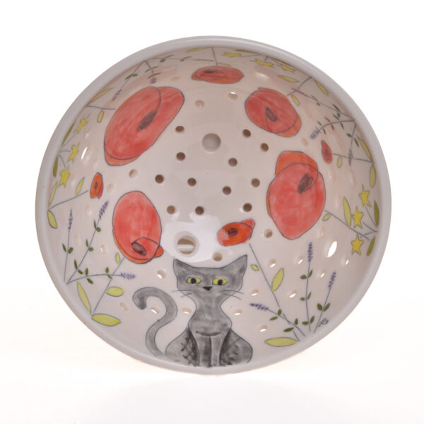 Wash and prep fresh fruit and veggies in this bright and whimsy kitty cat berry bowl. Meghan’s cat, Twinkie, inspired these sweet cat designs! Each piece is thrown porcelain on the wheel and then carved. After each piece dries the black lines are carved into the porcelain with a sharp knife, then inlaid with black under-glaze. Each color is hand painted before being glazed with food safe glazes.