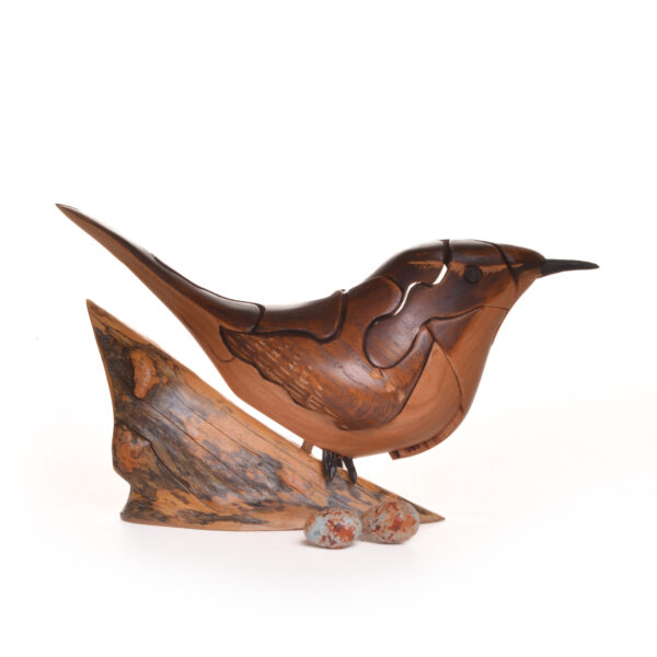 As you take this sweet Wren apart, you will find hidden eggs inside. Each piece comes with care and instructions. Growing up in the family wood shop, Peter's son Genesis Chapman has built upon his father's line of puzzles, as well as developed his pursuits in painting and the arts.