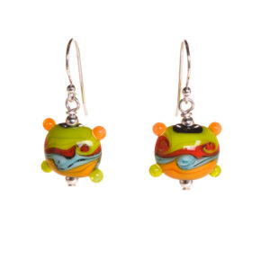 These multicolor handmade glass bead earrings are inspired by Van Gogh. Teresa Brittain creates glass beads over a torch, using the centuries-old technique of lampworking, then combines the beads with sterling silver findings and chains to create unique pieces of wearable art.