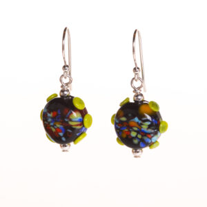 Handmade black button tab glass bead earrings created over a torch. Teresa Brittain creates glass beads over a torch, using the centuries-old technique of lampworking, then combines the beads with sterling silver findings and chains to create unique pieces of wearable art.