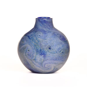 Take flower arrangements to a new level in this swirly blue handblown glass vase by Michael Hatch of North Carolina. This piece is perfect for fresh cut flowers or a dried arrangement.