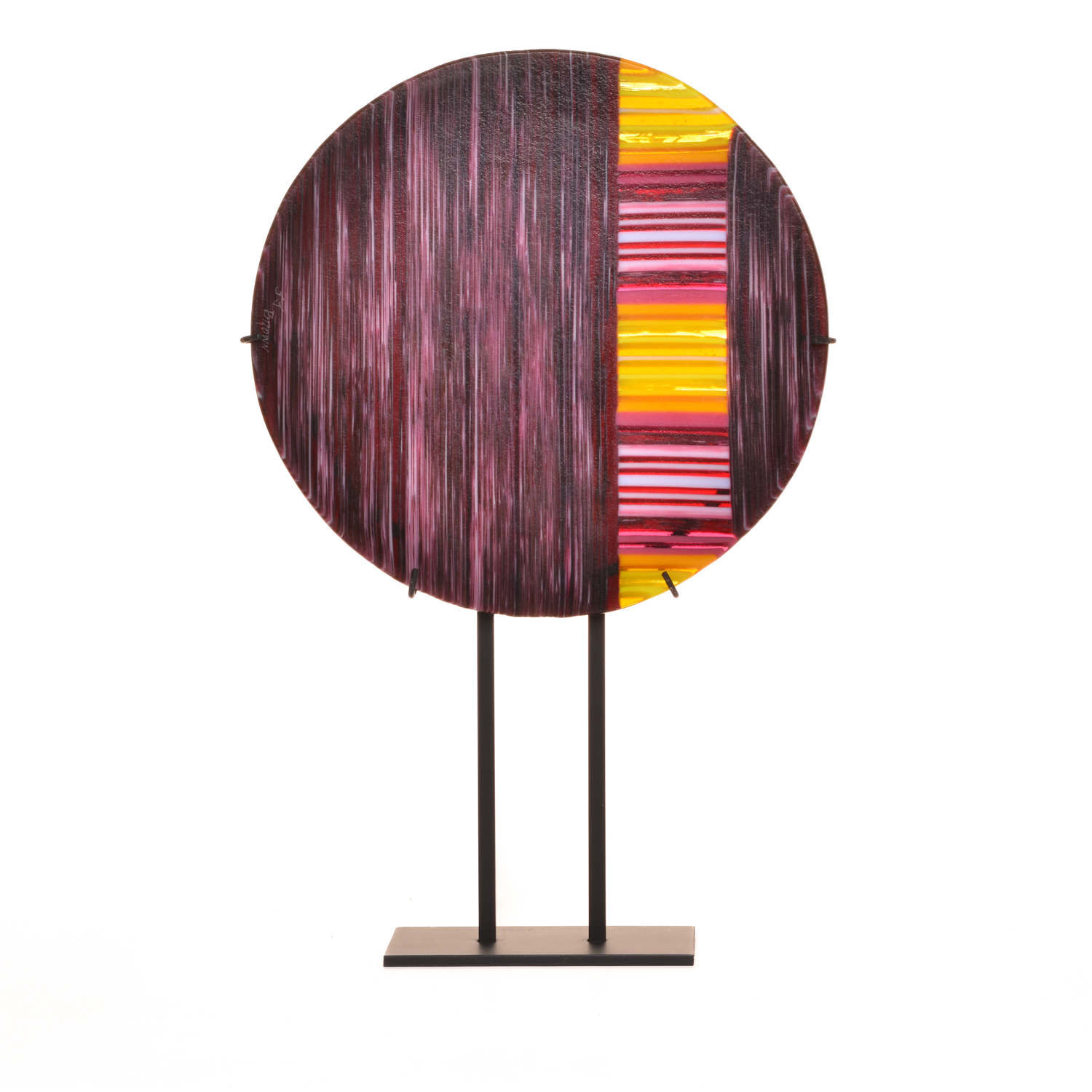 Round fused glass panel in a sturdy black metal stand by Fyreglas Studio of Western North Carolina.