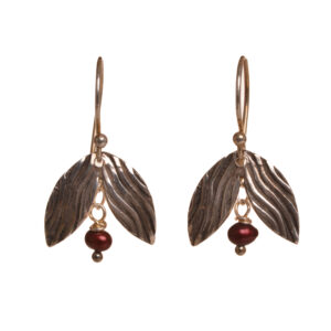 Striped sterling silver flower bud earrings with red pearls by Bob and Lucy Gibson.