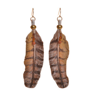 Hawk feather earrings, hand tooled and painted on veg tanned leather. Thin, slightly flexible and very light. The design is drawn on the leather, tooled, cut out and shaved down thin. They are then soaked with a leather dye that stiffens the leather, and shaped as they dry. Finished with a coat of clear sealer.
