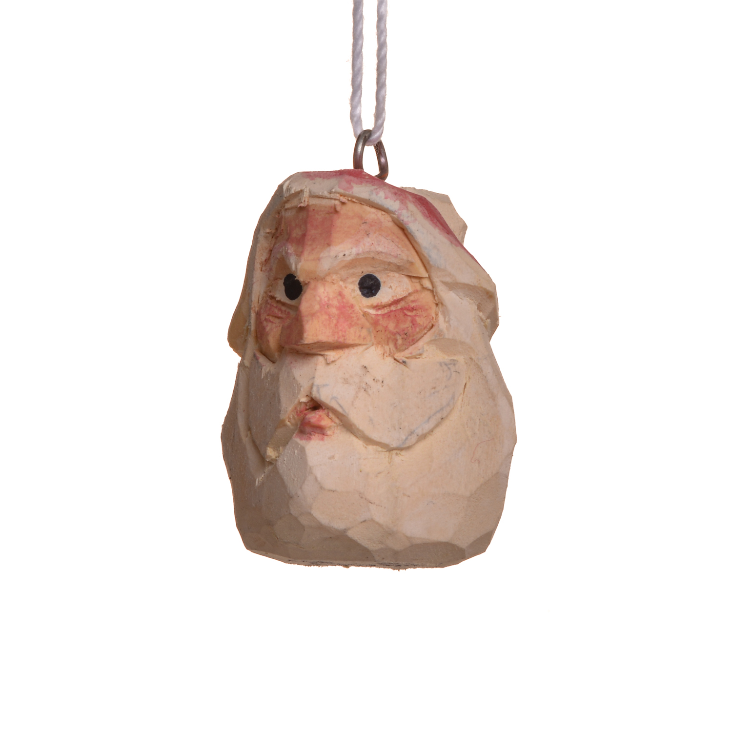 Mini hand-carved and painted Santa ornament by Mike Shults of Tennessee. Most of his carvings are made from reclaimed or "junk" wood; his ornaments, in particular, are carved from kindling. Expect differences in facial expression.