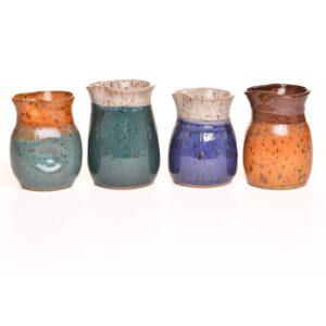 This dainty handmade ceramic creamer is the perfect piece for pouring your favorite creamer into a hot cup of coffee.