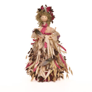 These sweet and whimsical cornhusk dolls are embellished with sticks, berries, lichen, and other natural materials that artist Dorothy McMillan forages near her East Tennessee home. She also adds a small leaf with her initials as a hallmark on the back. To preserve the beauty of each doll lightly feather dust and keep out of direct sunlight. Each sold separately.