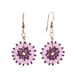 Round disk earrings featuring handwoven glass seed beads by jeweler Leslie Fawcett of Tennessee. With a needle and nylon thread, Leslie takes tiny glass seed beads and weaves them into larger beads that are then rolled up and sewn together. The use of the peyote stitch allows the ends of the rectangle to interlock when sewn together, and repeated passes through the beads reinforce the whole.