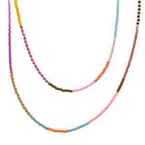 This playful color-block necklace features handwoven glass seed beads by jeweler Leslie Fawcett. Wear it alone, layered, long, or wrapped.