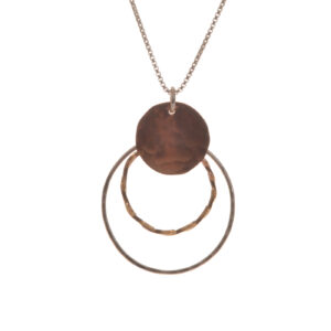 Handcrafted mixed metal necklace made from twisted and hammered sterling silver, rose-gold, and yellow-gold by silversmith Suzanne Farran-Hrytzik of North Carolina. Great for everyday wear. Expect slight variations in design.