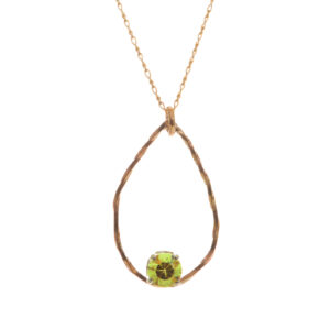 Beautifully designed and handcrafted gold-fill and topaz necklace by silversmith Suzanne Farran-Hrytzik of North Carolina. This pendant is sure to catch the light and shine bright, with gold-fill elegantly twisting around a lustrous yellow topaz on a matching gold chain.