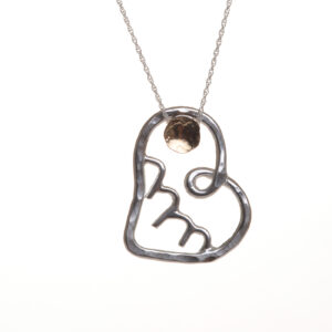 Add a piece of mountain love to your collection with a beautifully designed and handcrafted sterling silver and gold-filled "Asheville Strong" necklace by silversmith Suzanne Farran-Hrytzik of North Carolina. This piece features a gold-filled sunset shining brightly over a sterling silver mountain. Easy to clean and great for everyday wear. Expect slight variations in design.