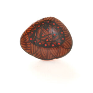 Original designs hand-painted on mountain rocks by Mänya Pirkle of Tennessee. Each piece is inspired by fossils, pottery, and cave paintings—representing traces of human existence that have survived the ages.