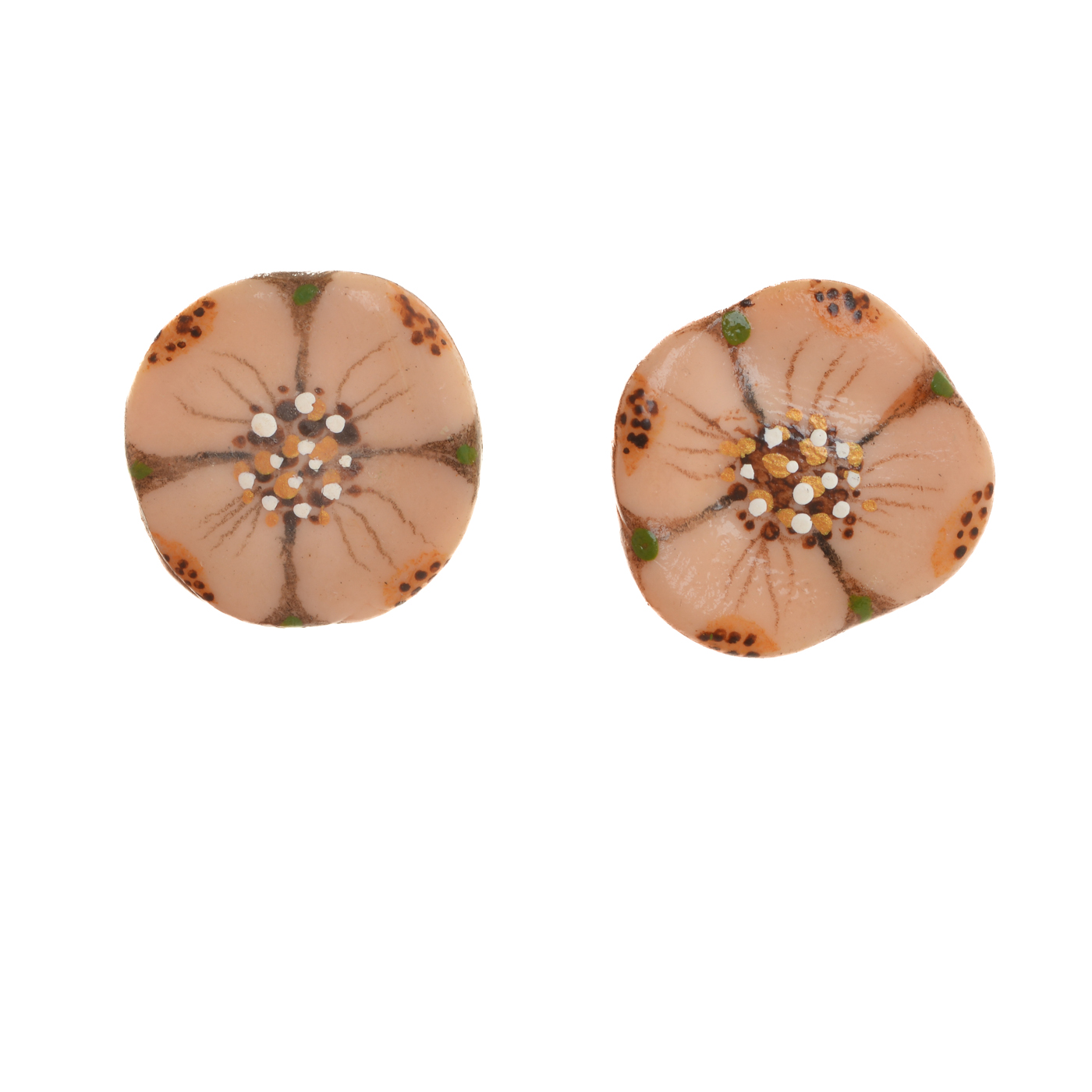 Original designs hand-painted on sunbaked paper clay by Mänya Pirkle of Tennessee. Each piece is inspired by fossils, pottery, and cave paintings—representing traces of human existence that have survived the ages.