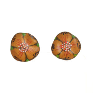 Original designs hand-painted on sunbaked paper clay by Mänya Pirkle of Tennessee. Each piece is inspired by fossils, pottery, and cave paintings—representing traces of human existence that have survived the ages.