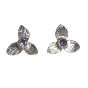 Sterling silver floral earrings based on the Trillium flower. The center is accented by a amethyst. Biologically-inspired jewelry by Charity Hall of Virginia.
