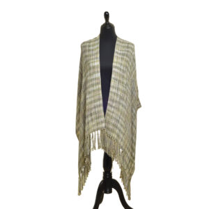 This beautifully handwoven shawl features a subtle, elegant plaid pattern in muted shades of  sage green, grey, and cream, perfect for any season. Its soft texture and elegant fringe offer a touch of charm, making it a versatile and stylish accessory for any outfit. Albena's pieces embody craftsmanship that blends traditional designs and techniques with modern styles. In her wide range of weavings, she is guided by the principles of beauty, function, and meaning. Wearables may be hand-washed or dry-cleaned. Lay flat to dry. Pre-washed in organic wash and ready to be enjoyed!