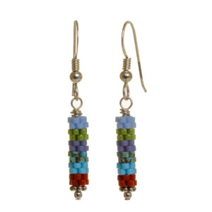 Round tube earrings featuring handwoven glass seed beads by jeweler Leslie Fawcett of Tennessee. With a needle and nylon thread, Leslie takes tiny glass seed beads and weaves them into larger beads that are then rolled up and sewn together. The use of the peyote stitch allows the ends of the rectangle to interlock when sewn together, and repeated passes through the beads reinforce the whole. Different colors available.