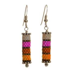 Round tube earrings featuring handwoven glass seed beads by jeweler Leslie Fawcett of Tennessee. With a needle and nylon thread, Leslie takes tiny glass seed beads and weaves them into larger beads that are then rolled up and sewn together. The use of the peyote stitch allows the ends of the rectangle to interlock when sewn together, and repeated passes through the beads reinforce the whole. Different colors available.