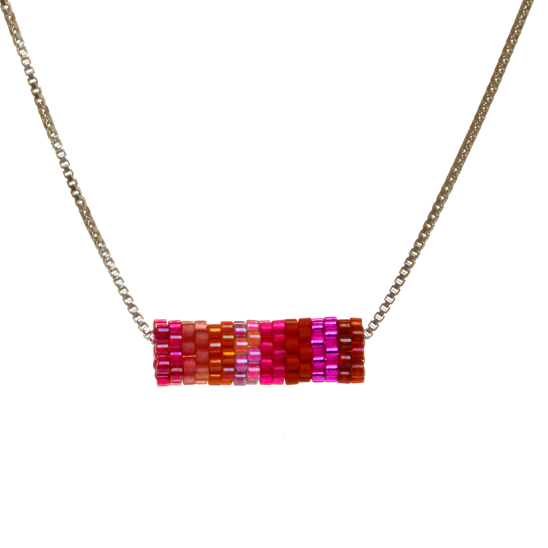 Round tube necklace featuring handwoven glass seed beads by jeweler Leslie Fawcett of Tennessee. With a needle and nylon thread, Leslie takes tiny glass seed beads and weaves them into larger beads that are then rolled up and sewn together. The use of the peyote stitch allows the ends of the rectangle to interlock when sewn together, and repeated passes through the beads reinforce the whole. Different colors available.