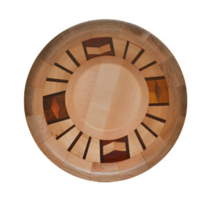Segmented turned bowl made using maple, walnut, cherry, yellowheart, purpleheart, and padauk. No stains are used. All woods are natural color.