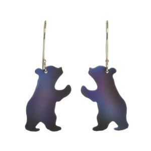 These playful itty-bitty bear cub silhouette earrings are made of lightweight and durable Titanium that has been colorized with the flame of a torch. Great for everyday wear. Please note each item is unique and no two are exactly the same, colors may vary from the photo.