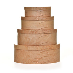 Traditional Birdseye Shaker box with copper tacks. Using the methods of old Shaker craftsmen, artist Jeffrey Neil uses thin wood strips that are made with a cut finger pattern. Hot water soaking makes this wood pliable, and the wood is bent to an oval shape in a single motion. Copper tacks in the fingers fix the oval shape. The top and bottom are secured with wooden pegs.