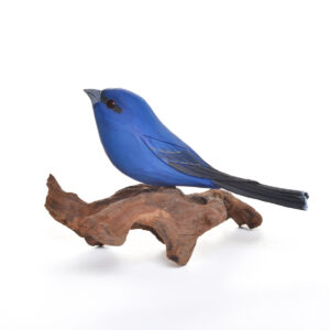 Wooden carved and painted Indigo Bunting. Artist Tony Dills hand carves and paints his birds and attaches them to pieces of wood. Nature has always been an important part of Tony’s life.