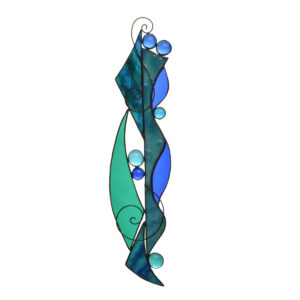 Whimsical handcrafted suncatcher by stained glass artist Cheryl Stippich of western North Carolina. This playful suncatcher features textured stained glass, glass nuggets, and wire squiggles.