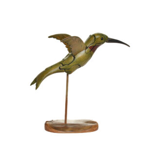 As you take this sweet hummingbird apart, you will find a hidden trumpet flower inside. Each piece comes with care instructions. Growing up in the family wood shop, Peter's son Genesis Chapman has built upon his father's line of puzzles, as well as developed his pursuits in painting and the arts.
