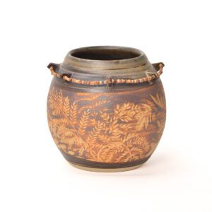 Rebecca Regal 2026, clay, wooden, clay and bone beads; iron oxide subtractive painting 6” x 6 ½”
