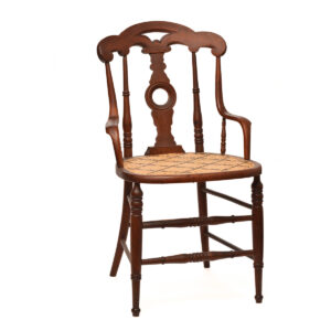 Douglas Lowman 2025, wood, cane; traditional 7-step method accented with chain motiff 34” x 19 ¼” x 21 ¾”