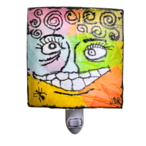 Colorful, "ugly-faced" nightlight created with a wire frame and covered with vinylized paper. Vinylized paper is made by layering tissue paper and Elmer's glue. The light is finished with a protective coating of spray lacquer.