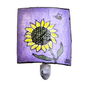 Bright and cheery flower nightlight created with a wire frame and covered with vinylized paper. Vinylized paper is made by layering tissue paper and Elmer's glue. The light is finished with a protective coating of spray lacquer.