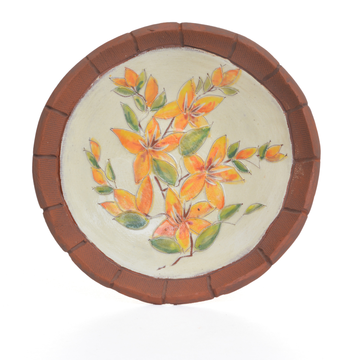 Small hand-made floral ceramic dish featuring hand-built, hand-painted pieces that contrast the rawness of the earthenware with a “canvas” of white slip, on which a botanical scene has been applied in underglazes. Each dish is “framed” by raw clay, like a painting or looking through a window. Each sold separately. Different colors available.