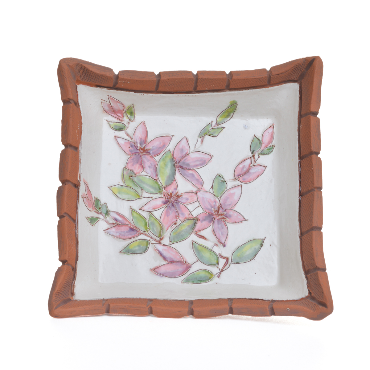 Small floral ceramic dish featuring hand-built, hand-painted pieces that contrast the rawness of the earthenware with a “canvas” of white slip, on which a botanical scene is applied using underglazes. Each dish is “framed” by raw clay, like a painting or looking through a window. Each sold separately. Different colors available.