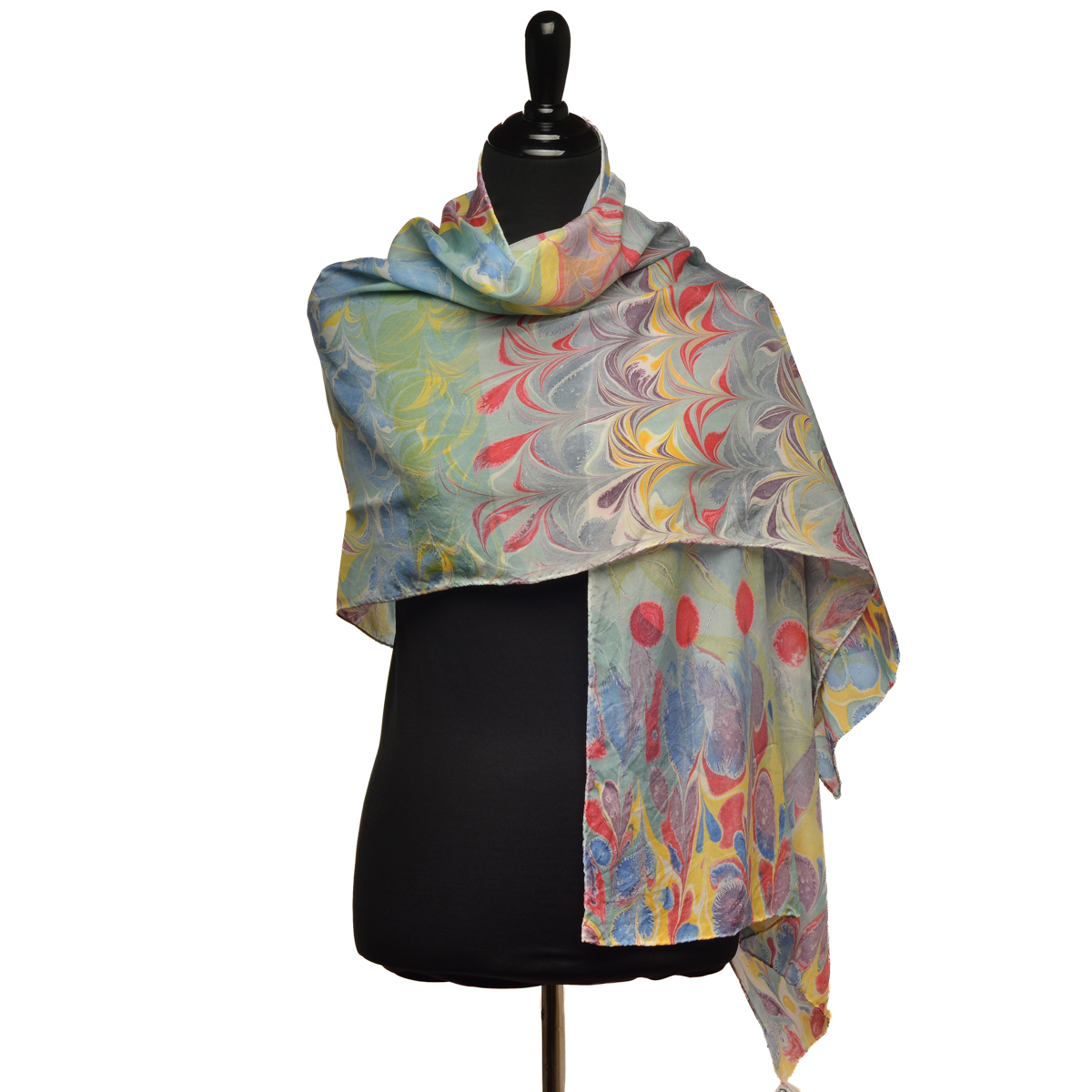 Hand-marbled silk scarf, especially designed using custom-mixed colors and patterns to set you apart! Wrap up in this beautiful celebration of colors.
