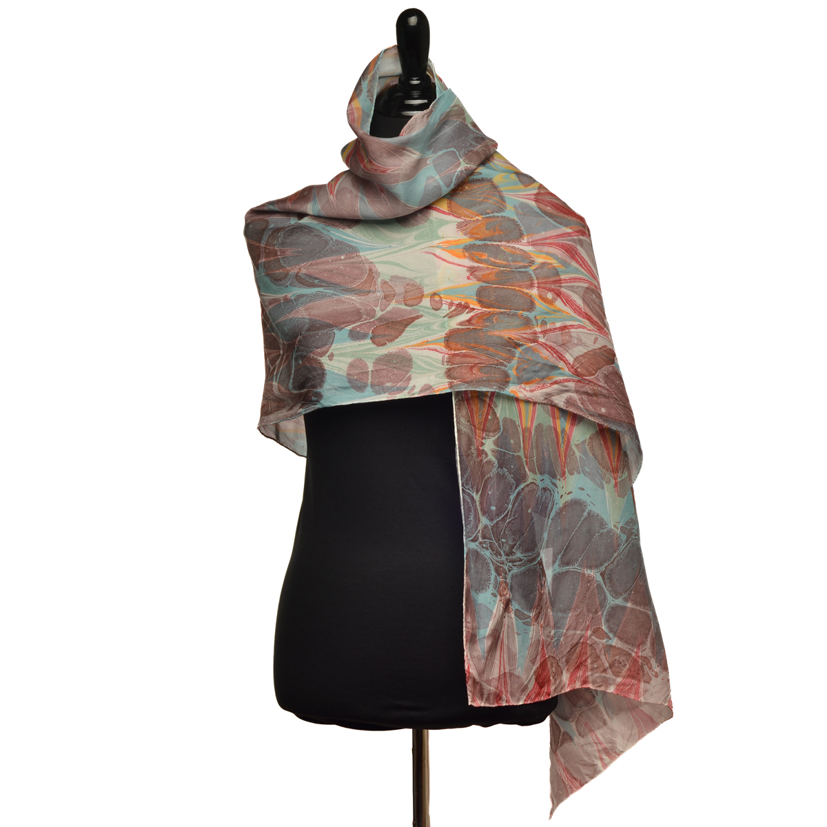 Hand-marbled silk scarf, especially designed using custom-mixed colors and patterns to set you apart! Wrap up in this beautiful celebration of fall colors.