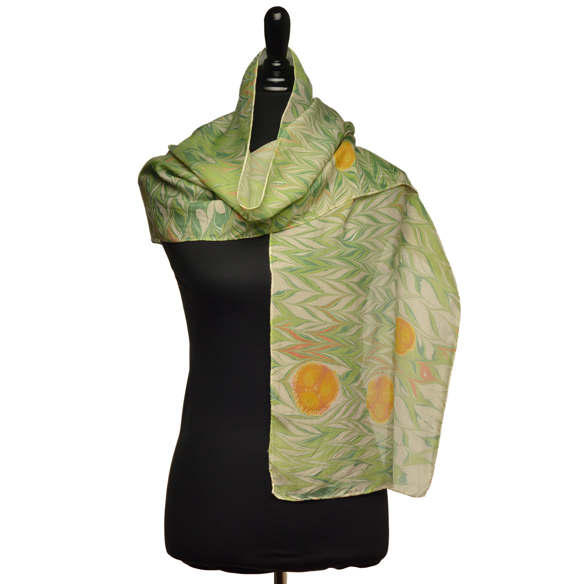 Hand-marbled silk scarf, especially designed using custom-mixed colors and patterns to set you apart! In folklore, the buckeye resembles a deer's eye, and many people carry one for good luck, so wrap some good luck around your shoulders!
