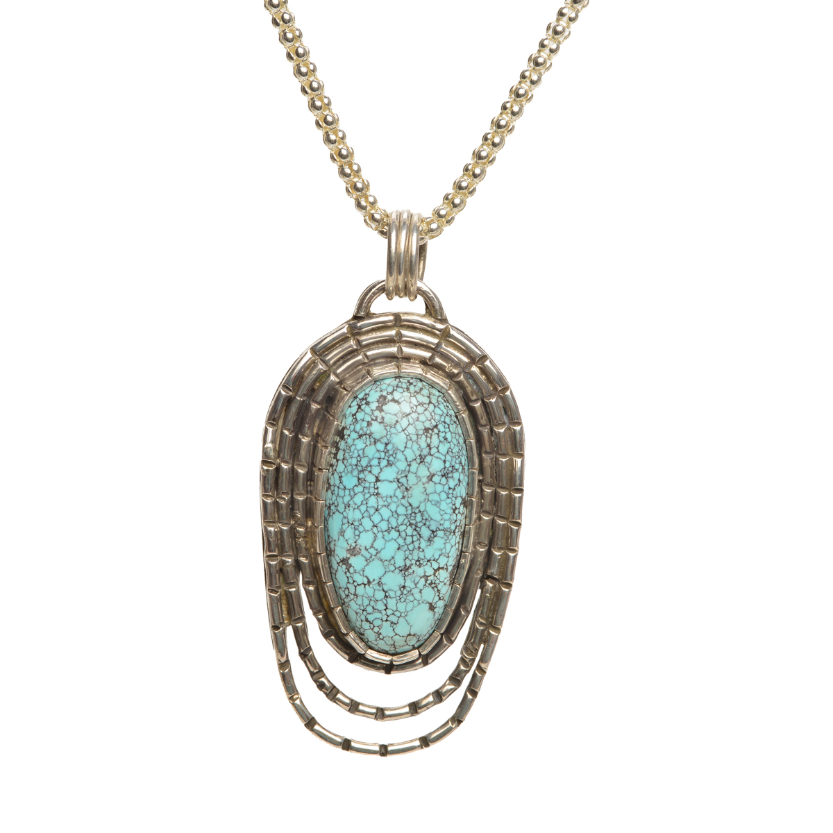 "Blue Spiral" handcrafted oxidized sterling silver pendant featuring a stunning matrixed Qingu turquoise by Ruthie Cohen of North Carolina. Bold contrasting texture and color merge seamlessly, creating a stunning statement piece.