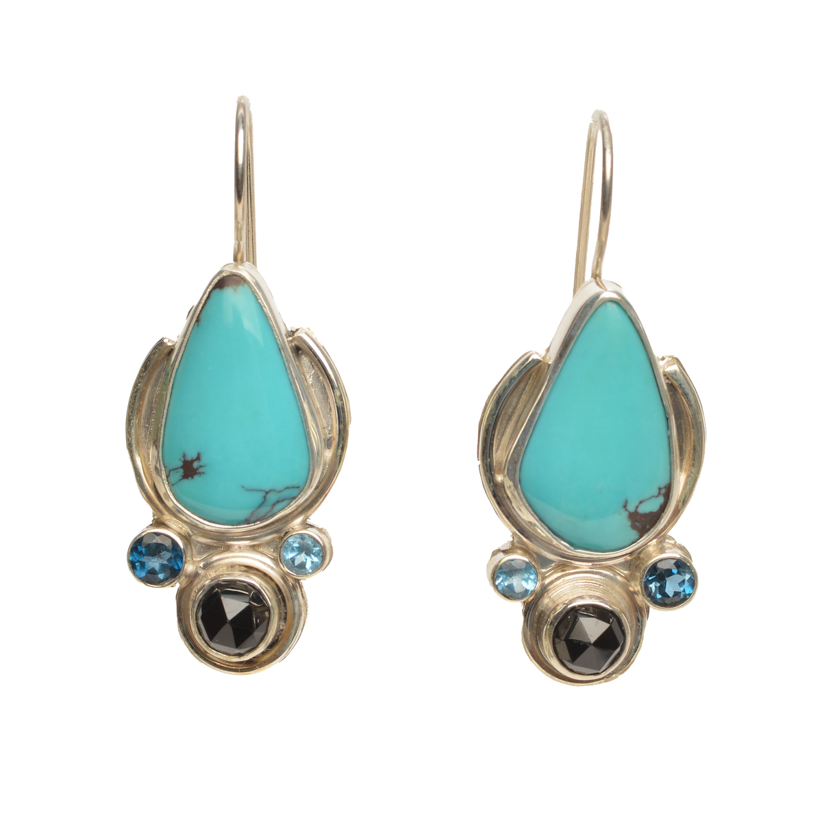 "Blue Lotus" handcrafted sterling silver earrings featuring striking castellated bezel-set Black Jack turquoise accented by a sparkling cluster of faceted black spinel, London blue topaz, and Swiss blue topaz, suspended from secure Continuum sterling silver locking earwires by Ruthie Cohen of North Carolina.