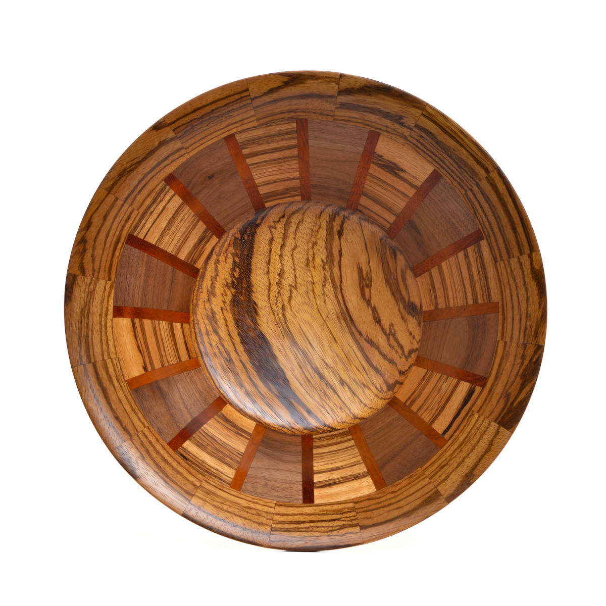 Segmented turned bowl made using zebrawood, walnut, and bloodwood. No stains are used. All woods are natural color.
