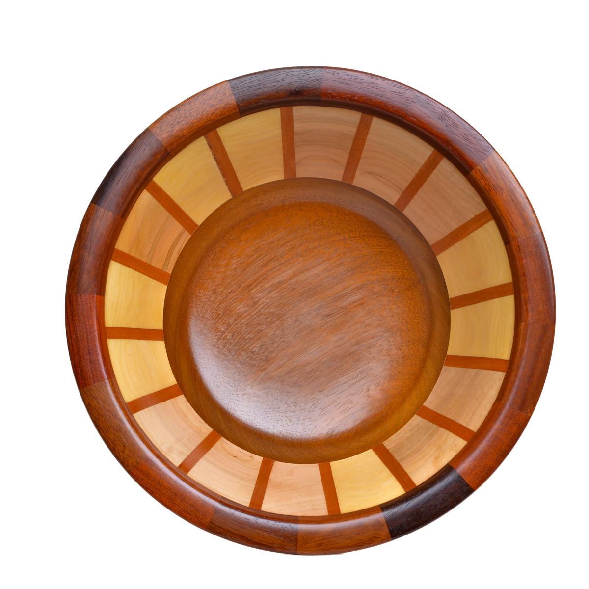 Segmented turned bowl made using walnut, oak, maple, and cherry. No stains are used. All woods are natural color.